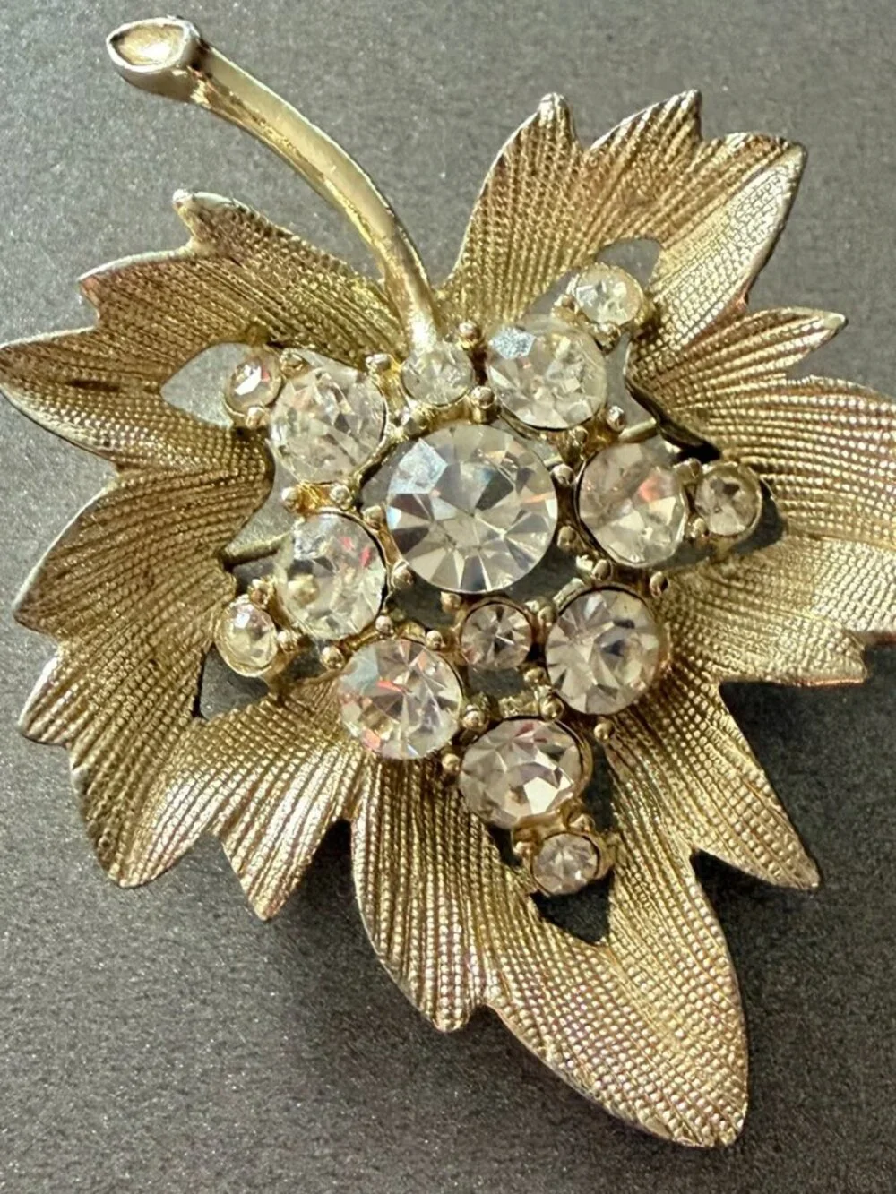Gold tone Leaf Brooch Clear Rhinestone setting